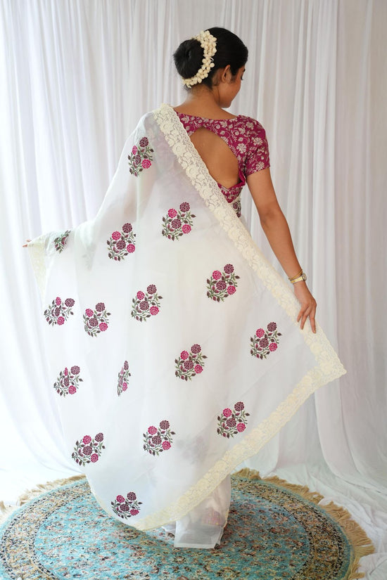 Elegant White Saree with Pink Floral Embroidery & Contrast Blouse