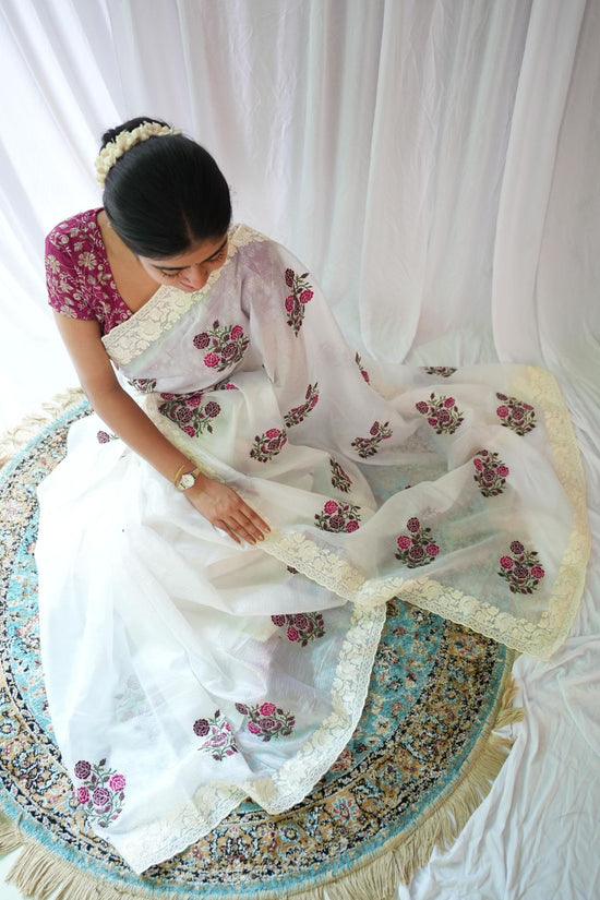 Elegant White Saree with Pink Floral Embroidery & Contrast Blouse