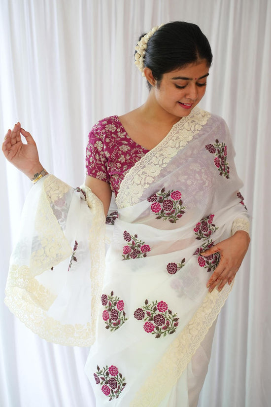 Elegant White Saree with Pink Floral Embroidery & Contrast Blouse