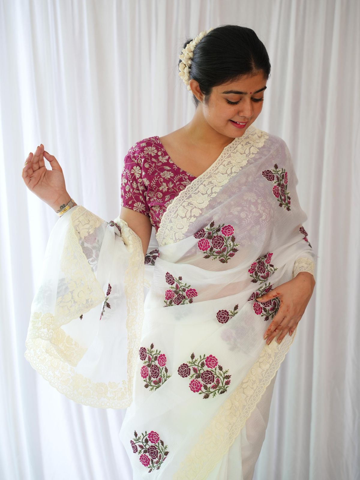 Elegant White Saree with Pink Floral Embroidery & Contrast Blouse