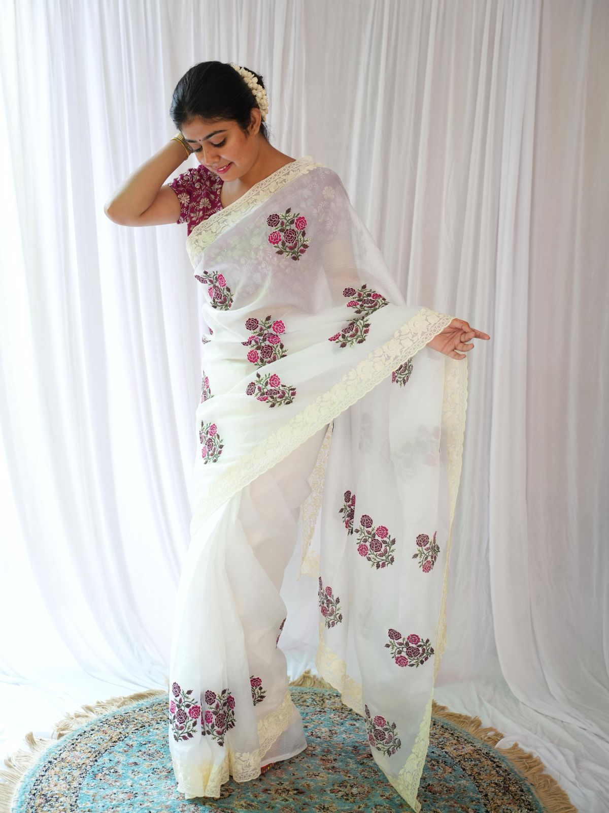 Elegant White Saree with Pink Floral Embroidery & Contrast Blouse
