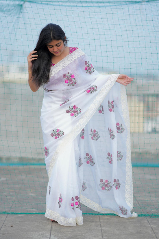 Elegant White Saree with Pink Floral Embroidery & Contrast Blouse