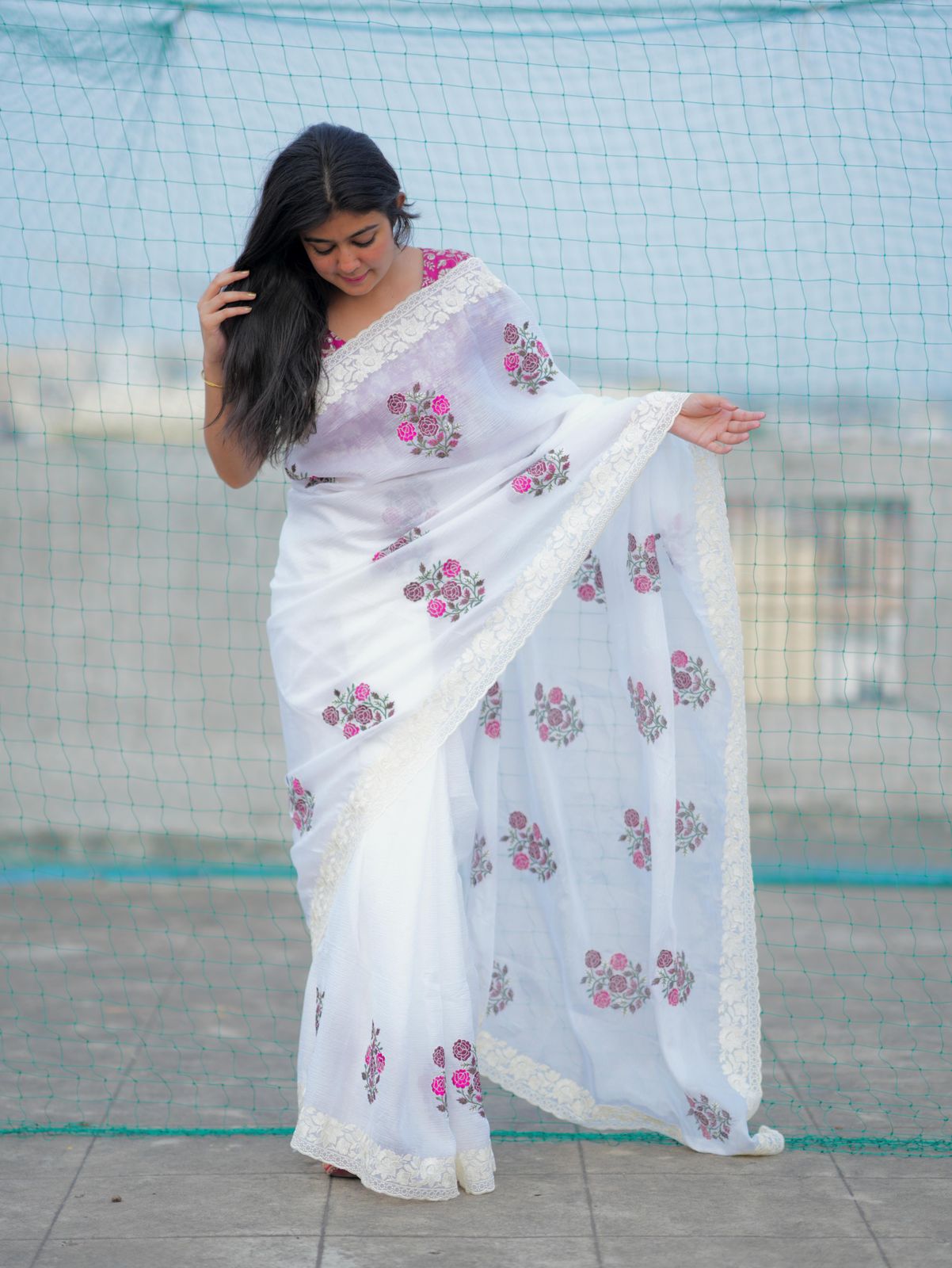 Elegant White Saree with Pink Floral Embroidery & Contrast Blouse