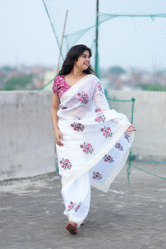 Elegant White Saree with Pink Floral Embroidery & Contrast Blouse