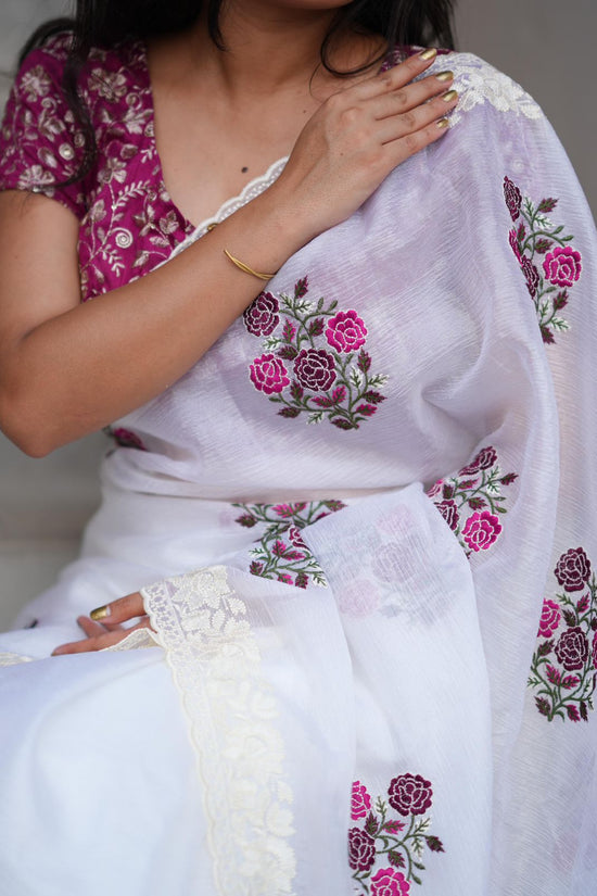 Elegant White Saree with Pink Floral Embroidery & Contrast Blouse