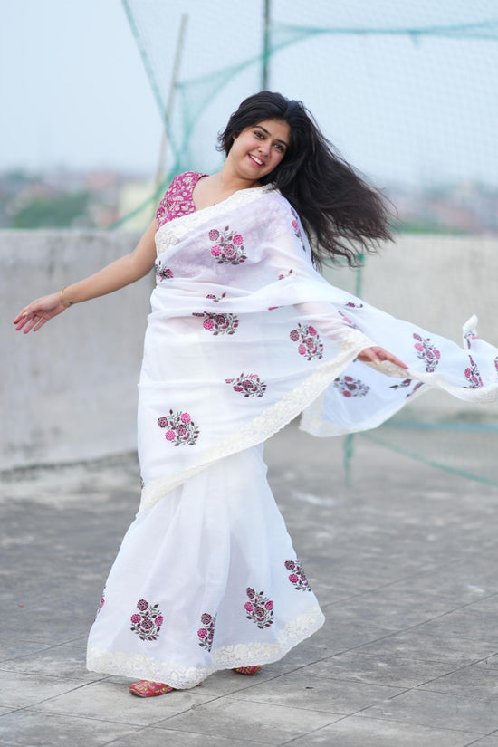 Elegant White Saree with Pink Floral Embroidery & Contrast Blouse