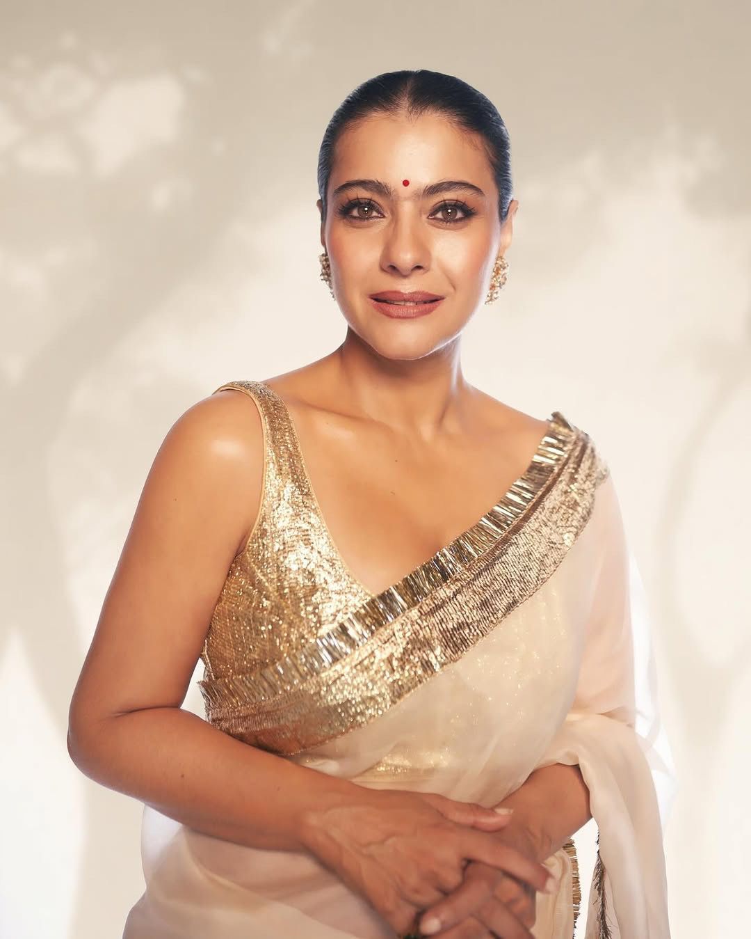 White Organza Saree with Metallic Golden Border
