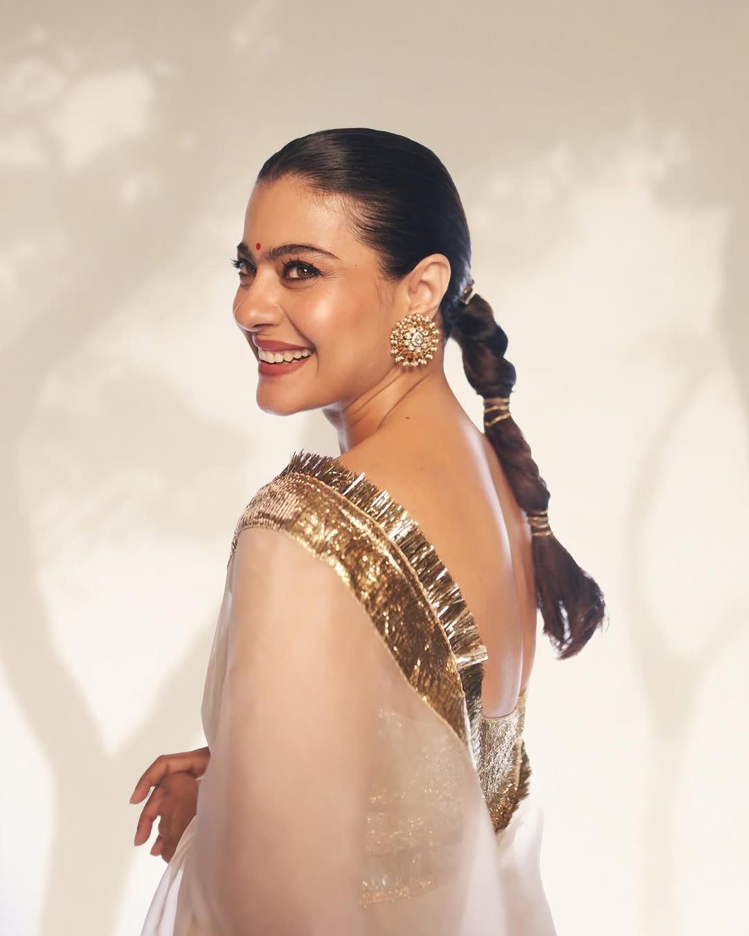 White Organza Saree with Metallic Golden Border