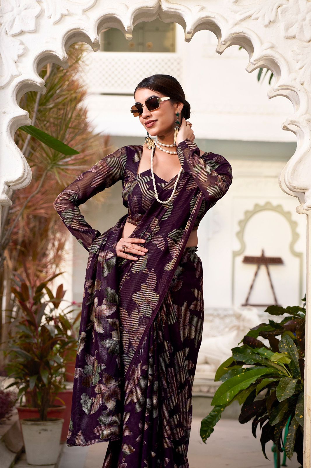 Navy Blue Faux Georgette Saree with Leaf Print & Stitched Blouse