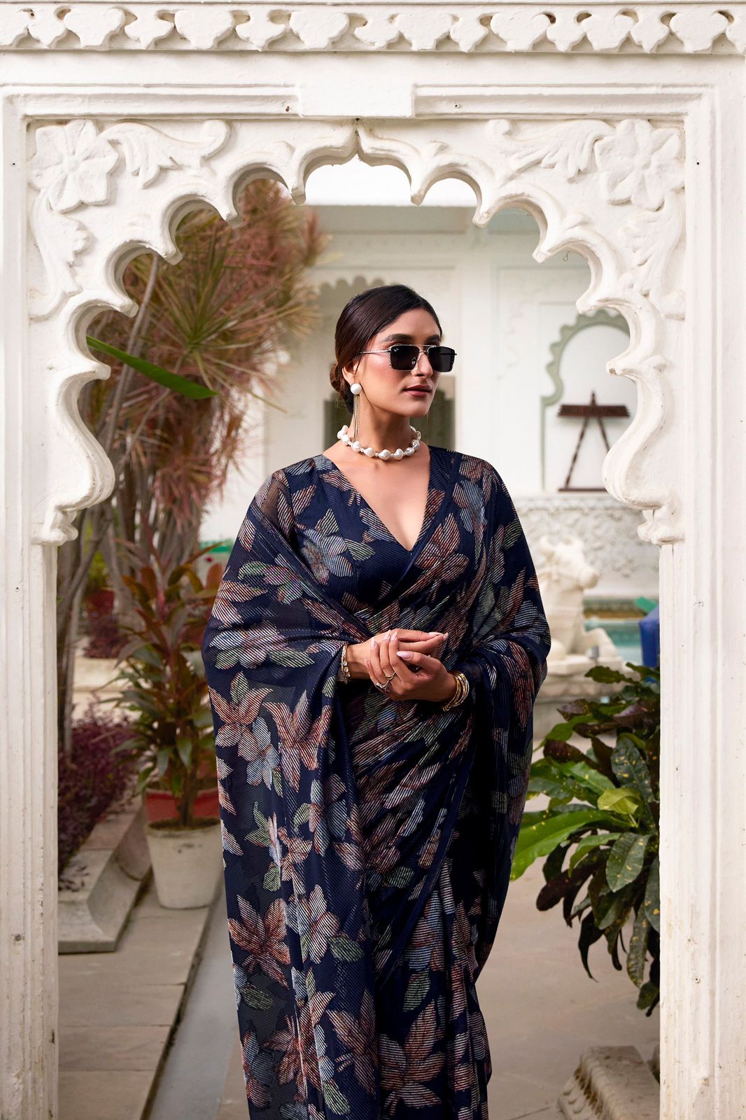 Navy Blue Faux Georgette Saree with Leaf Print & Stitched Blouse