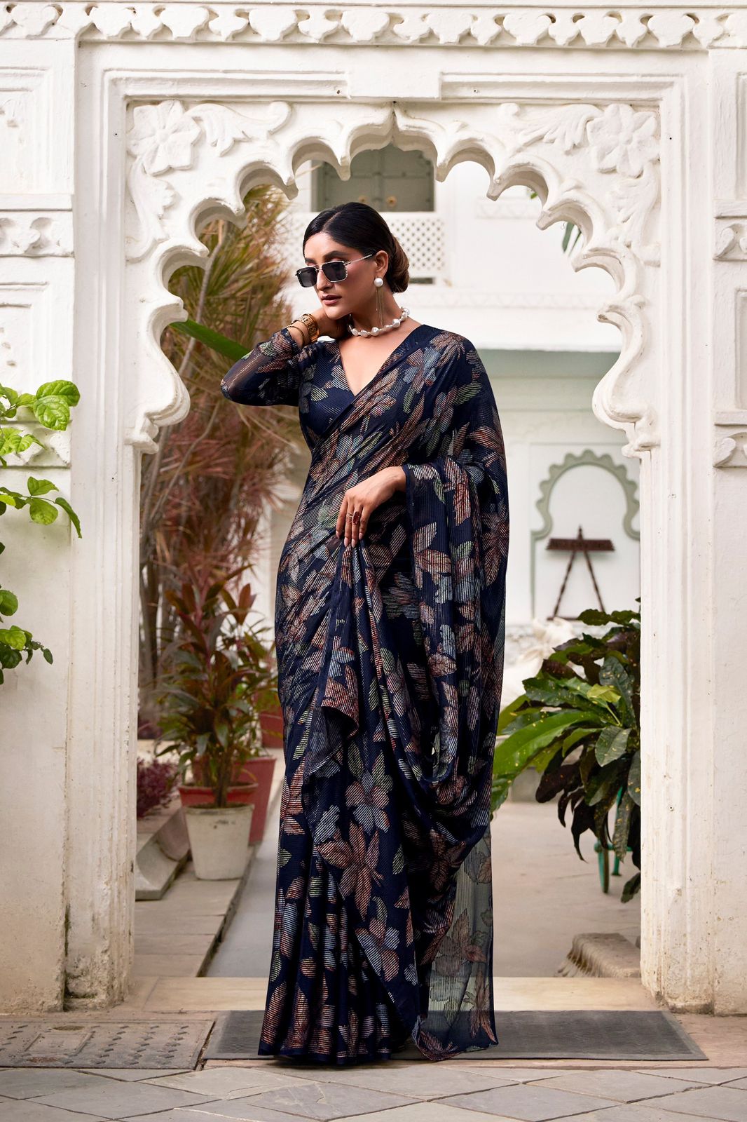 Navy Blue Faux Georgette Saree with Leaf Print & Stitched Blouse