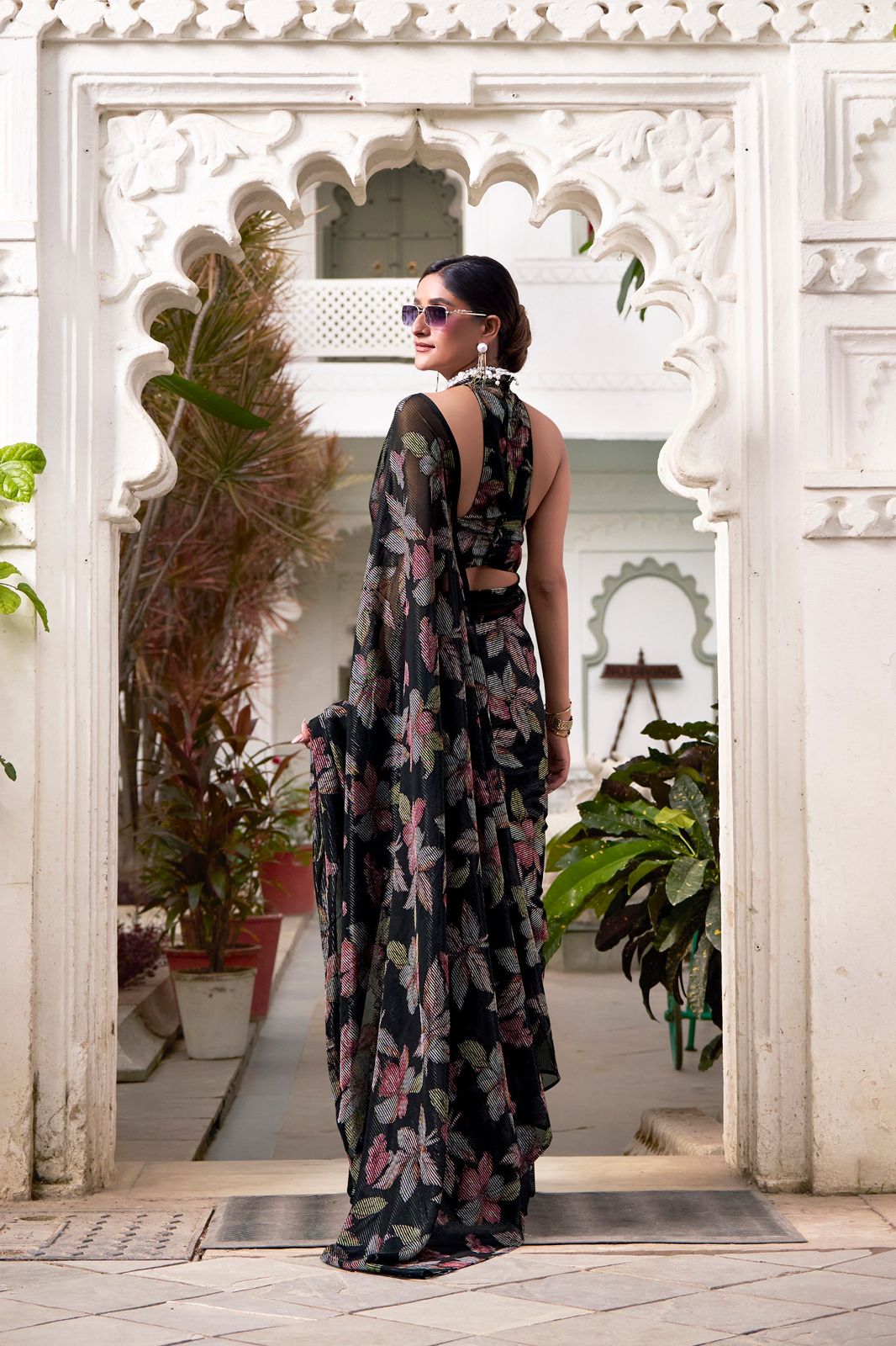 Navy Blue Faux Georgette Saree with Leaf Print & Stitched Blouse