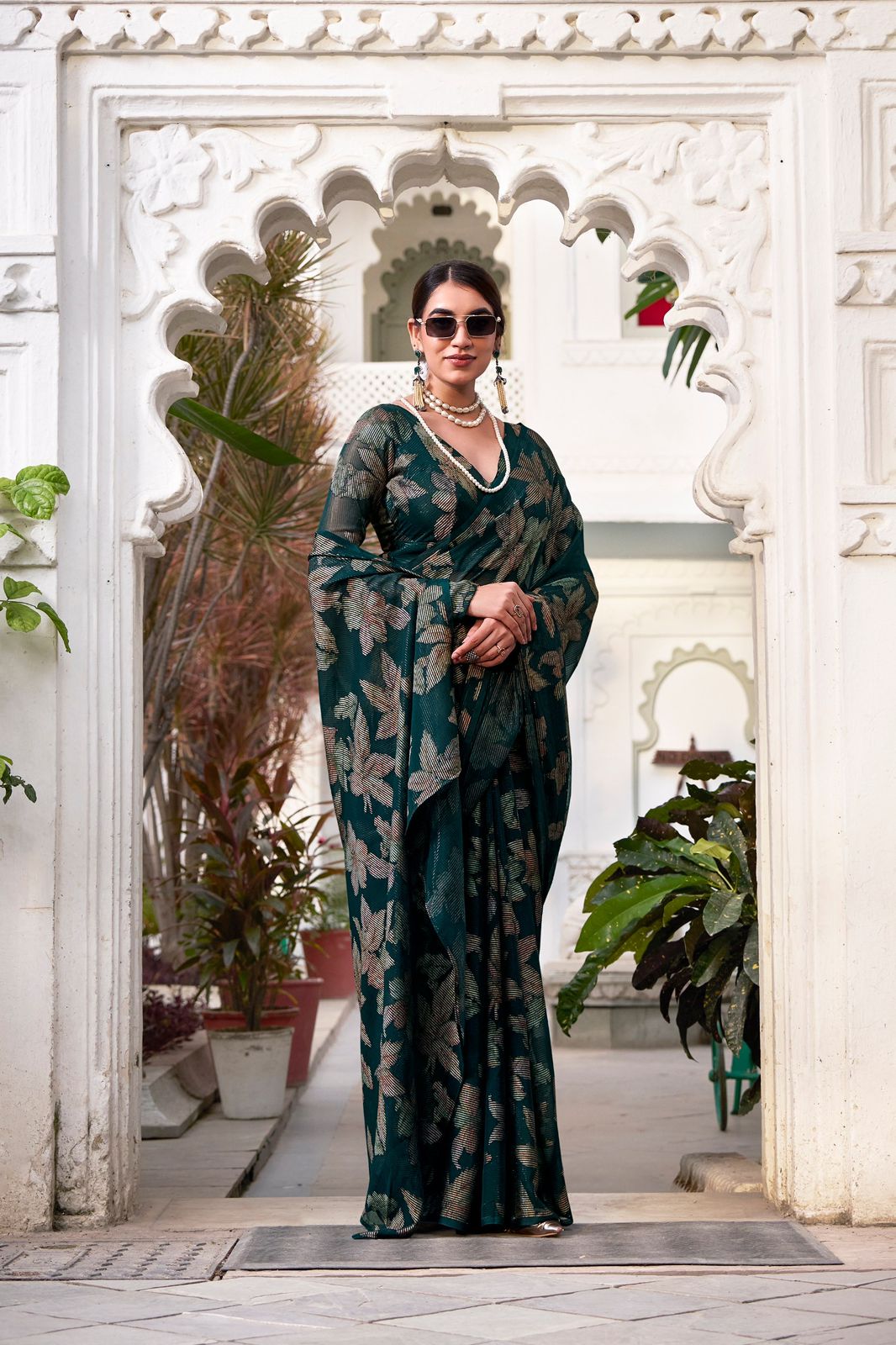 Navy Blue Faux Georgette Saree with Leaf Print & Stitched Blouse