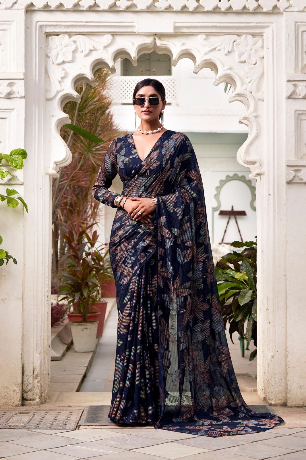 Navy Blue Faux Georgette Saree with Leaf Print & Stitched Blouse