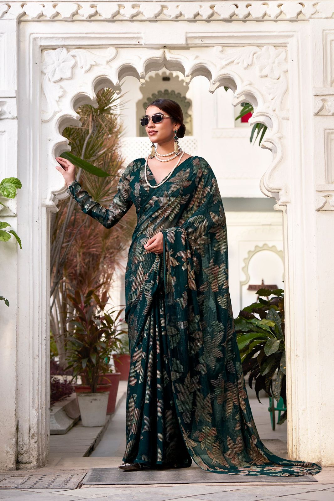 Navy Blue Faux Georgette Saree with Leaf Print & Stitched Blouse