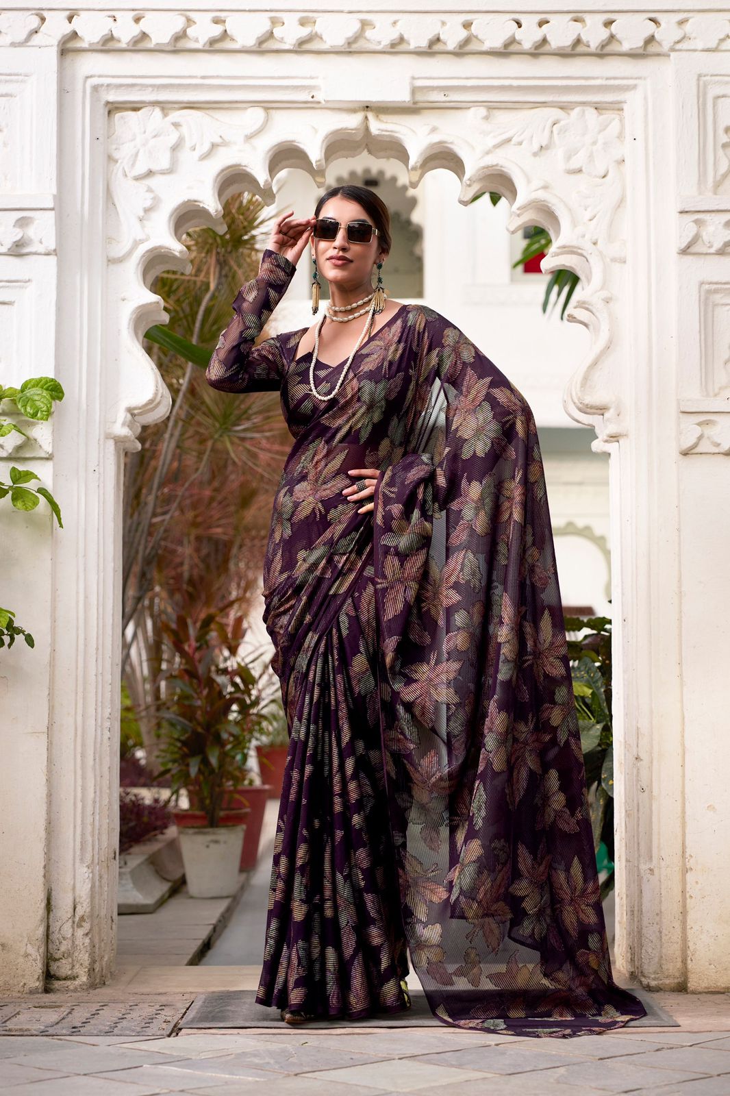 Navy Blue Faux Georgette Saree with Leaf Print & Stitched Blouse