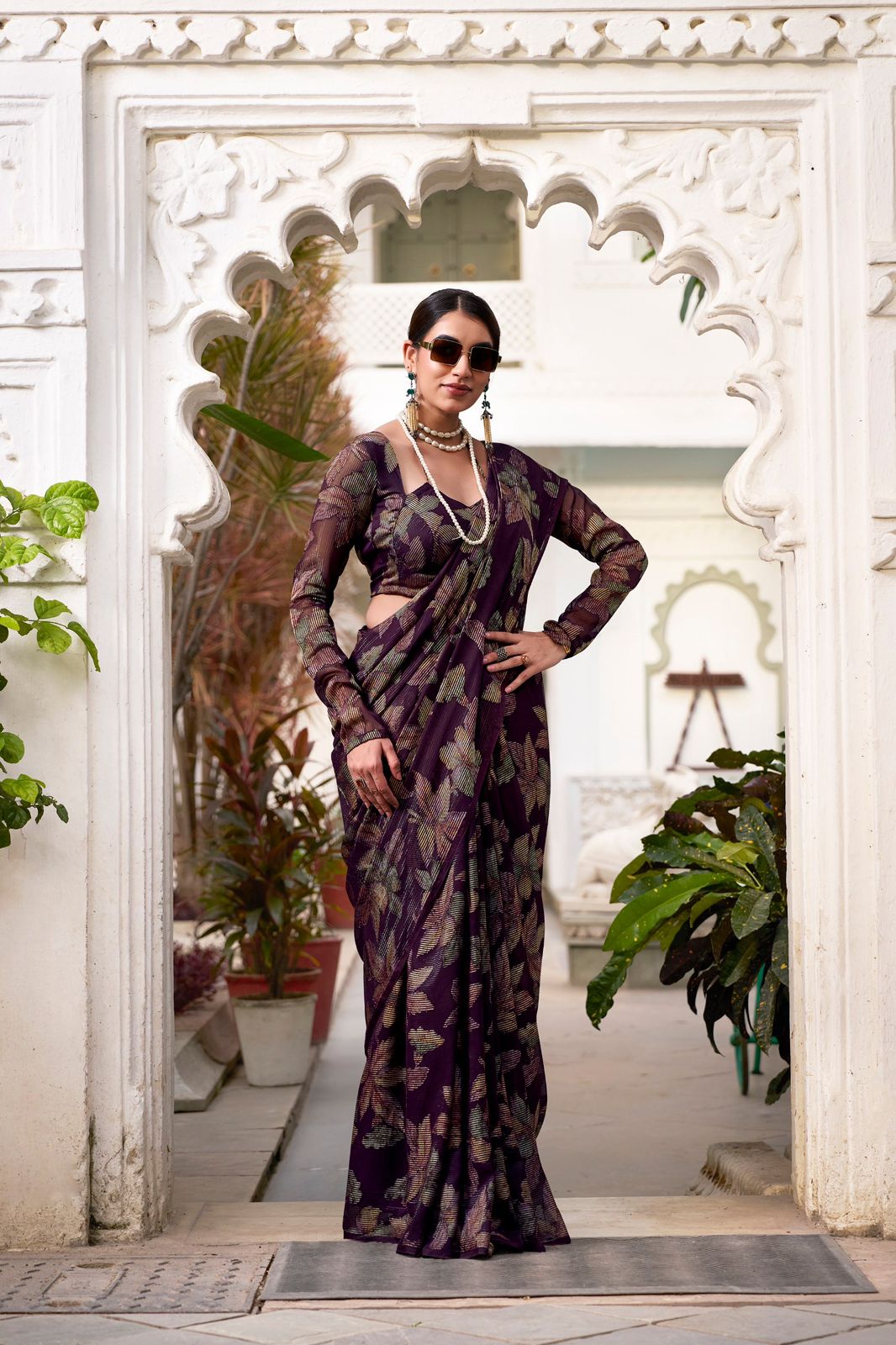 Navy Blue Faux Georgette Saree with Leaf Print & Stitched Blouse