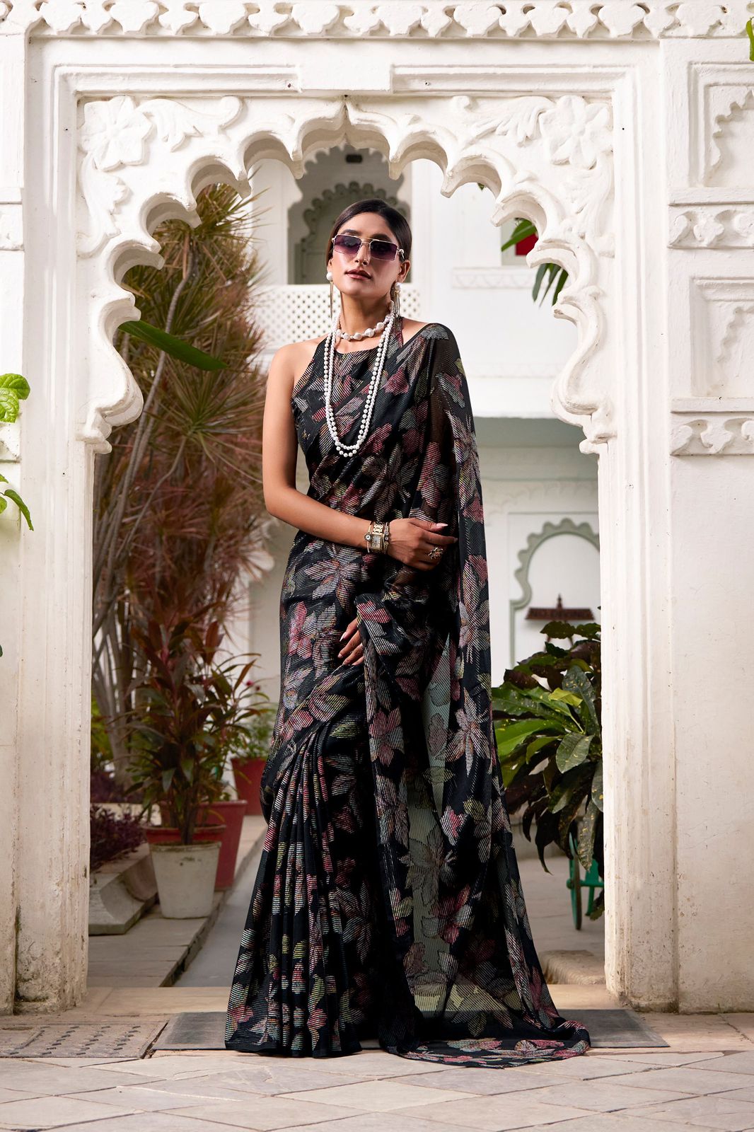 Navy Blue Faux Georgette Saree with Leaf Print & Stitched Blouse