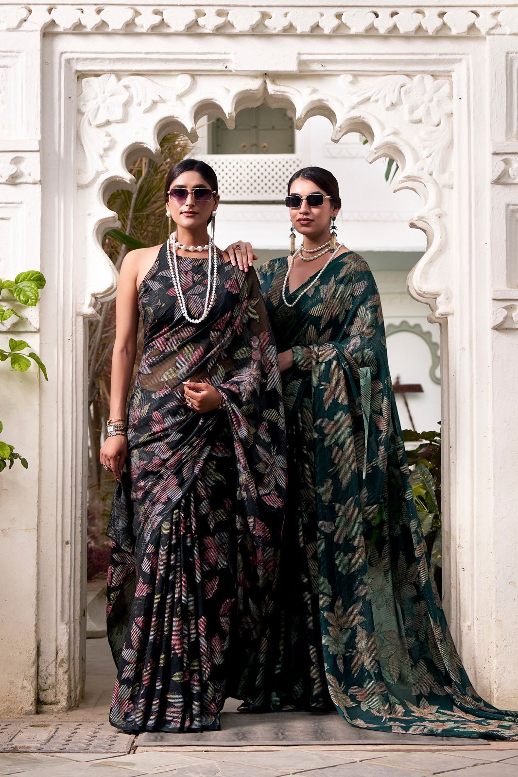 Navy Blue Faux Georgette Saree with Leaf Print & Stitched Blouse